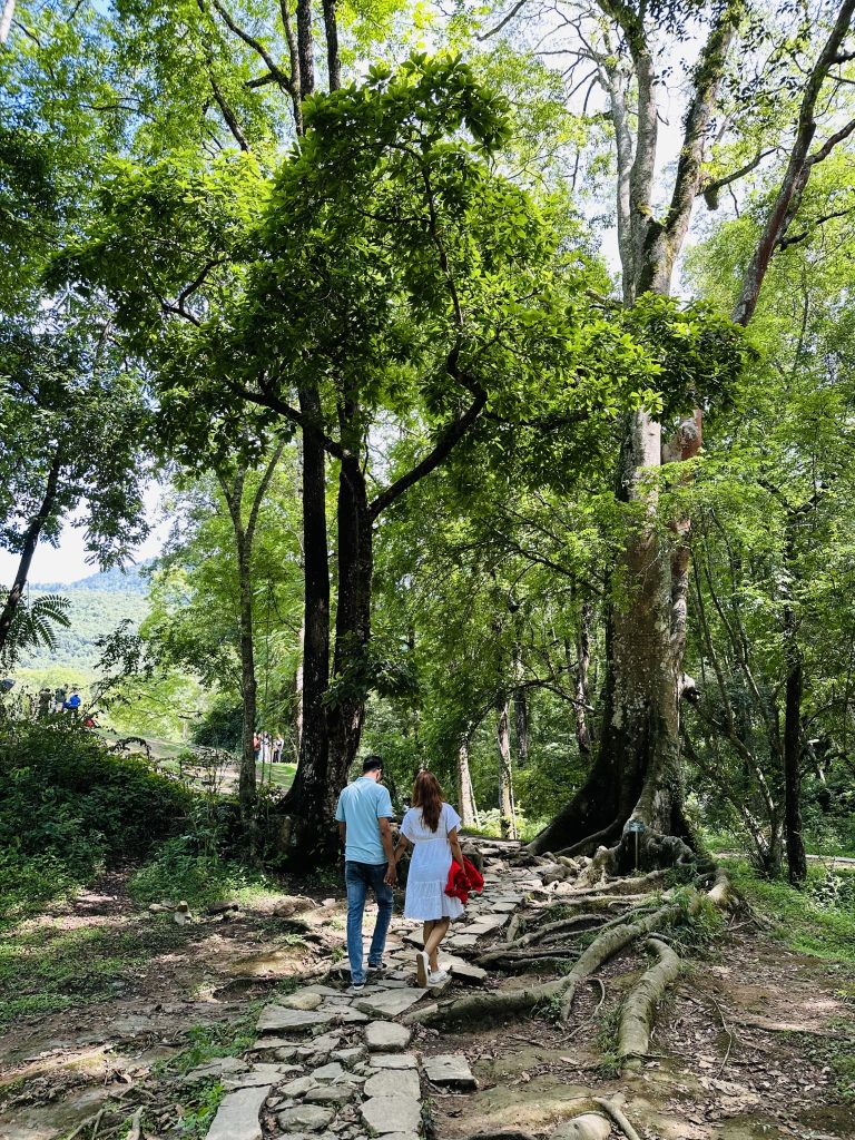 Couple walking in a park sharing love and care.