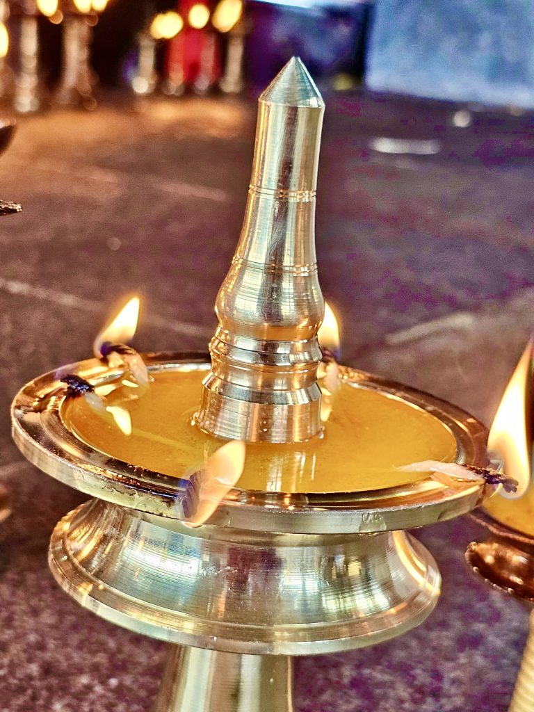 Traditional brass lamp using melted butter as fuel.