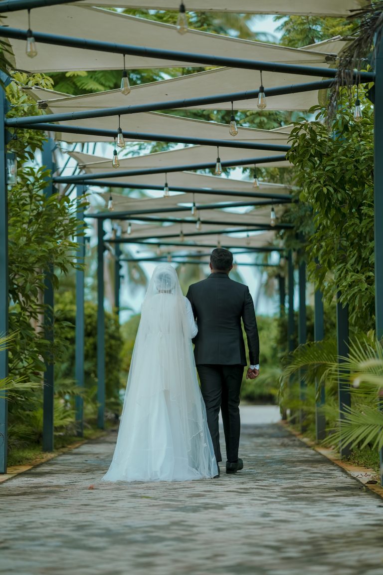 Married couples walking through a walking way