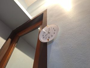 Clock hold on wall