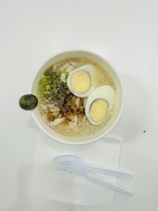 A popular lunch in Philippines includes rice, egg and other vegetables.