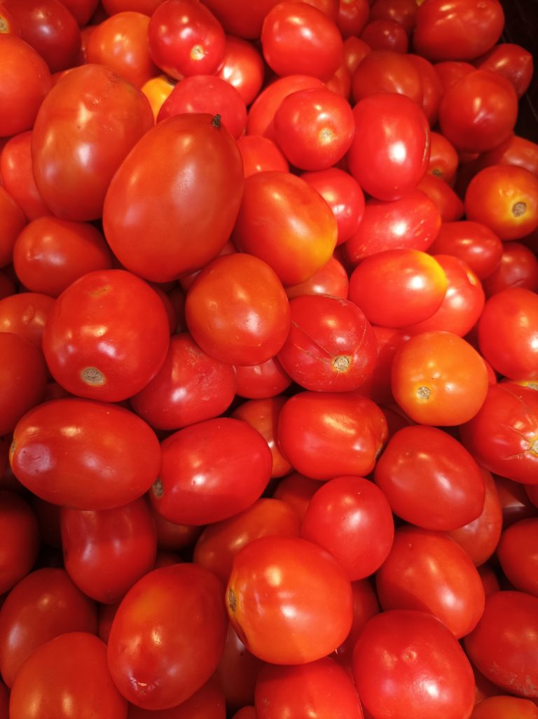 TomatosA vibrant display of ripe, red tomatoes.