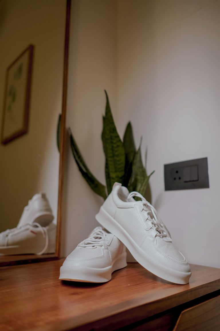 White shoe on a wooden table