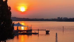 Sunset over the Potomac river, from hotel’s garden and waterfront in National Harbour, Maryland, USA
