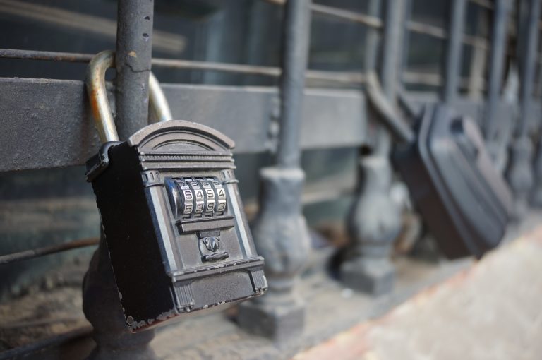 Big combination lock attached to a window