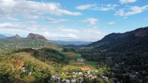 Drone shot of a valley between mountains, Adimaly Kerala.