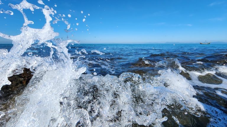 Sea waves crashing on rocks