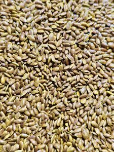 Close view of toasted flaxseeds. A street food in Ahmedabad. 