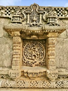 Marvellous stone carving art in a panel of Adalaj Stepwell complex. A monument from 15th century. Located in Gandhinagar, Gujarat. 