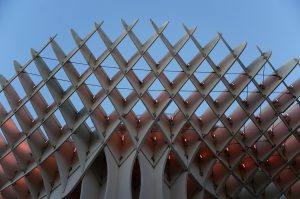 Metropol Parasol (Seville, Spain) with red light on at day