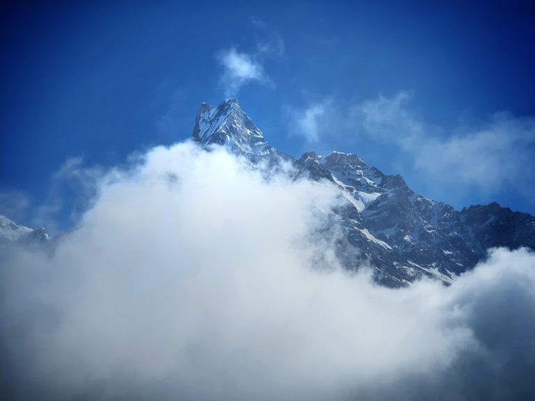 Beautiful view clouds rolling over fish-tail himal