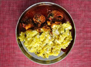 Kerala Style Kappa Puzhukku (Mashed Tapioca) and Fish Curry.