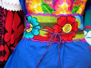 Mexican handcraft, flowers stitched on a dress