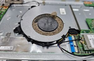 A dusty laptop cooling fan. 