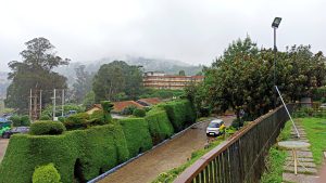 Misty morning view of the landscape in Ooty.