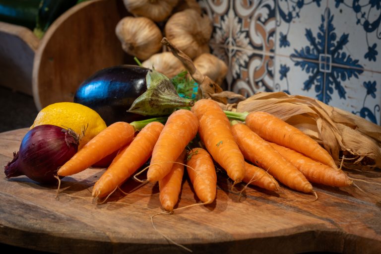 Fresh vegetables in a country-style kitchen.