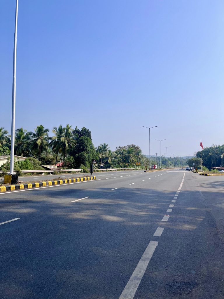 Highway road with blue sky at Dandeli-Goa route.