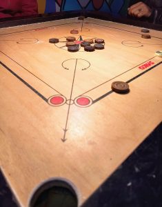 Few players playing carrom board