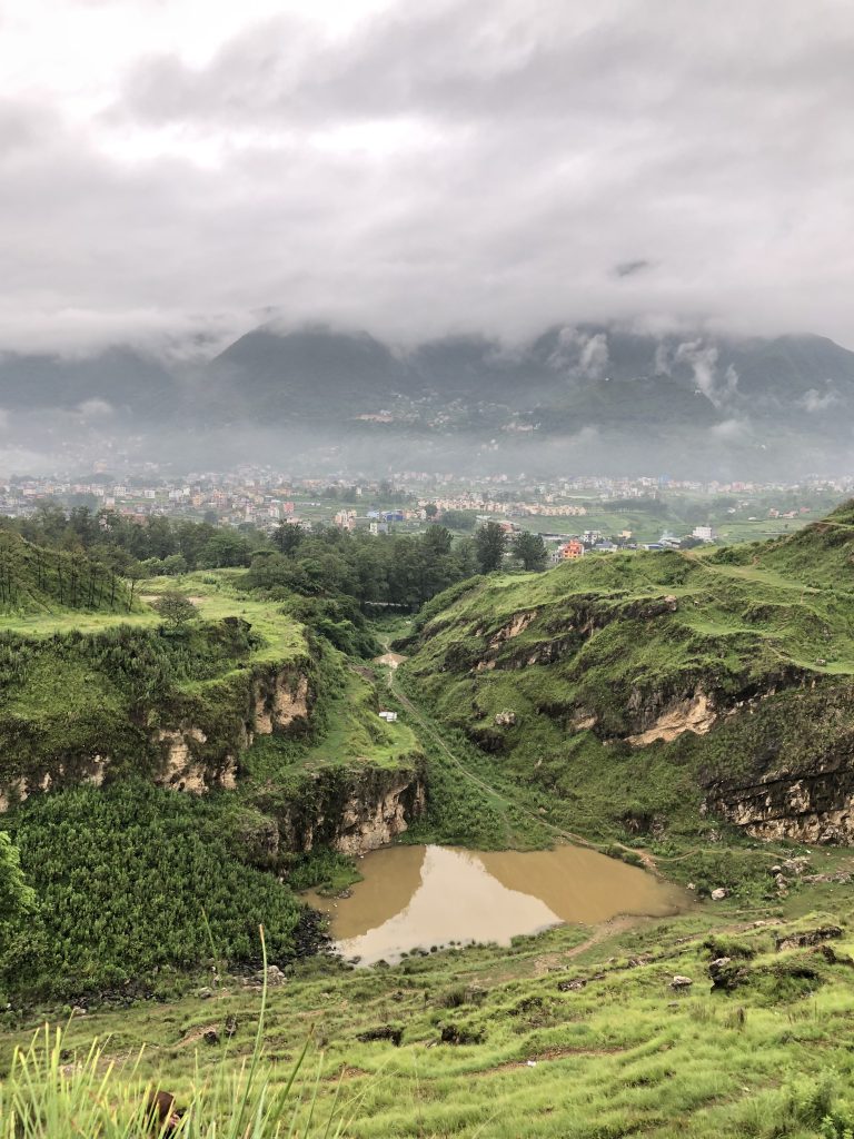 A small pond in between hills at Chovar, Kathmandu.