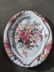 A plate with a floral design on it