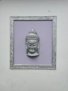 A piece of art representing Lord Buddha.
