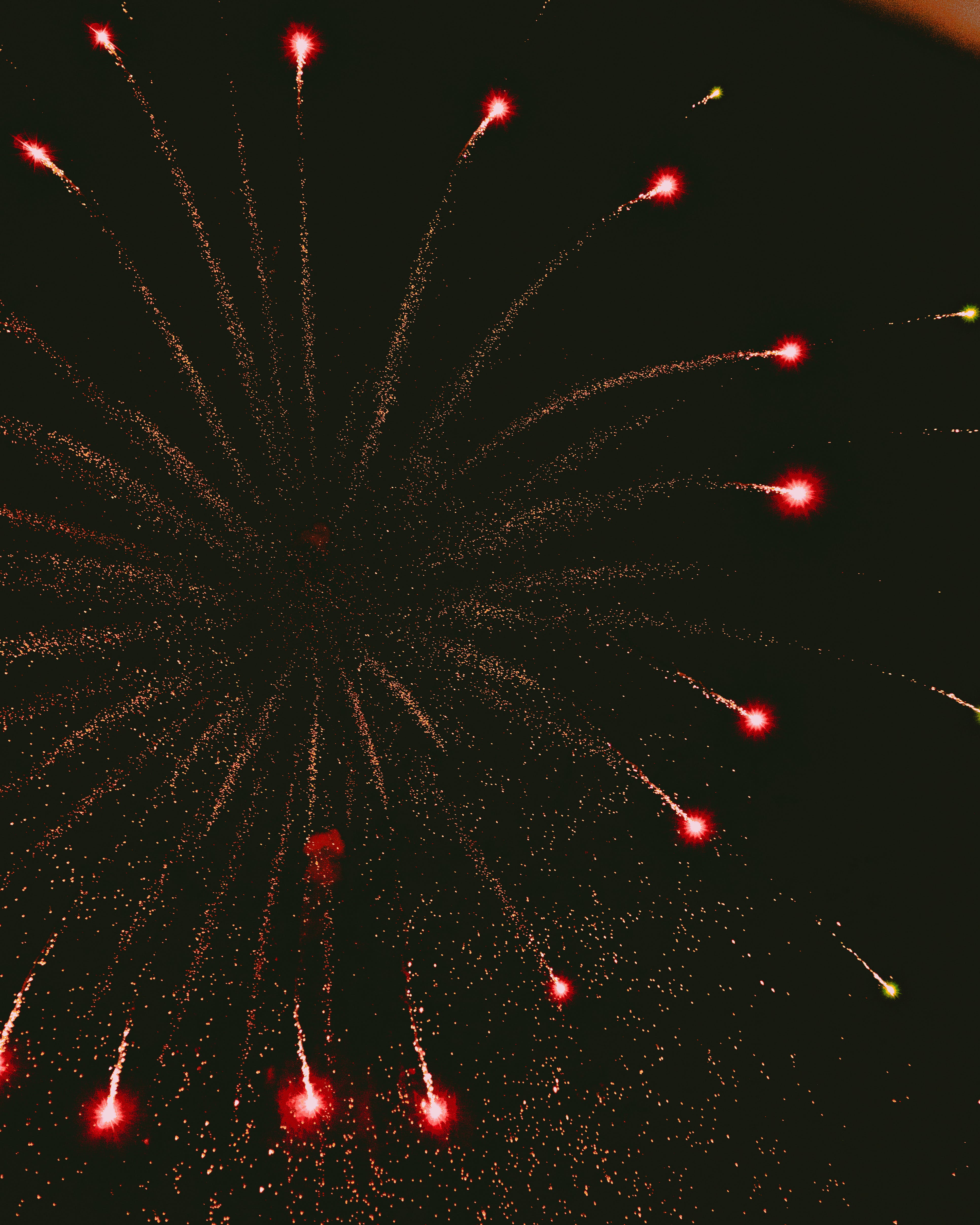 Explosive bursts of color paint the night sky as dazzling firecrackers illuminate the darkness in a mesmerizing celebration of light and joy.