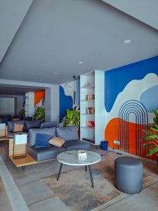 View larger photo: Modern office interior with couches, and colorful walls