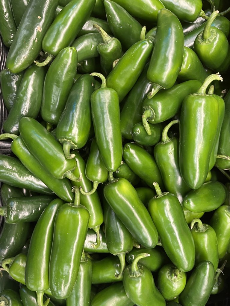 Spicy green chili peppers known as jalape?os.