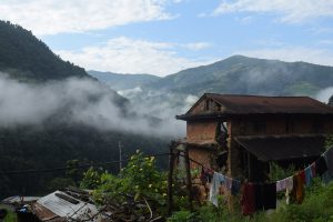 Old house at nuwakot, an ancient house sits nestled in the middle of rolling hills, its timeworn facade telling tales of years gone by. Surrounded by nature's embrace, the old structure exudes a quiet charm, standing as a silent witness to the passage of time.