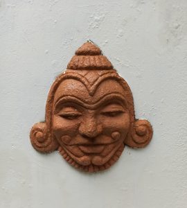 Mud face wall art