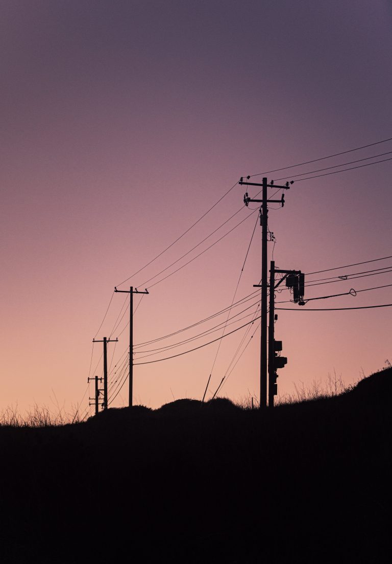 Photo of electricity pylons in the evening