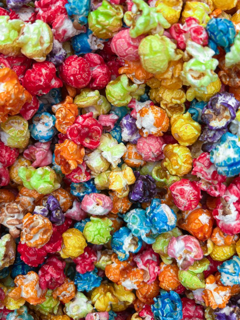 Close-up of colorful, sugary popcorn pieces