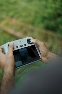 A hand-held remote control for a drone.