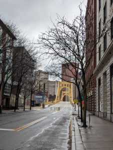 Pittsburgh’s Andy Warhol Bridge, with downtown in the background and the street leading to the Andy Warhol Museum in the foreground.
