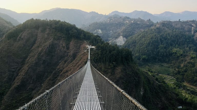 Bridge connecting mountains