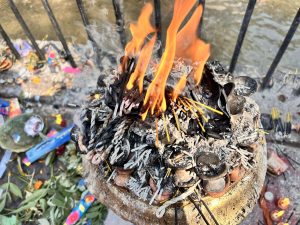 Candles flickering in the temple's surroundings!