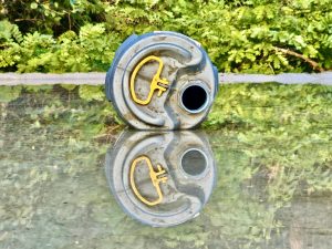 View larger photo: An empty chemical bottle & its reflections on the water to wet the concrete. From our neighbourhood, Perumanna, Kozhikode, Kerala.