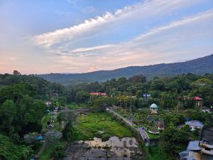 Evening view of the park situated at the bottom of a Peechi Dam in Thrissur, Kerala, India. The green mountains frame the background. 