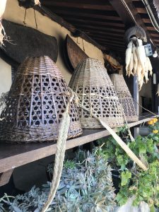 View larger photo: 3 Traditional Nepalese bamboo basket(Doko and Namlo) and bamboo syagu on the wall.