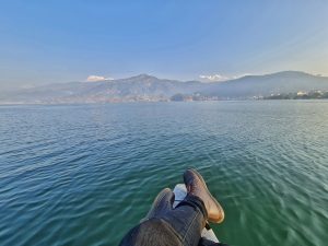 Relaxing aboard a boat on Fewa Lake in Pokhara, Nepal.