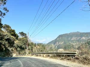 Scenic road pitch leading to snowy mountain bliss!