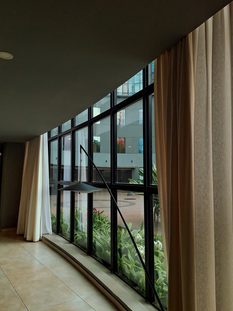 Glass window with curtains