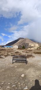 View larger photo: blue sky, seating table, mountains