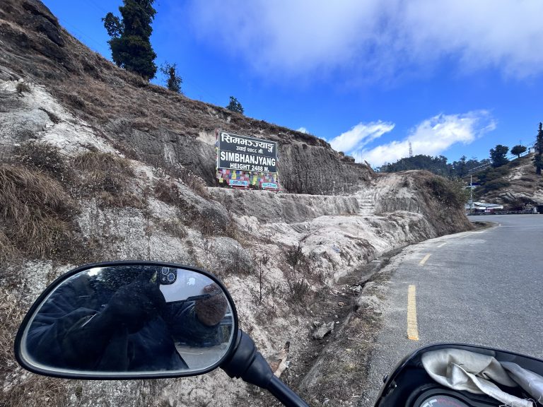 Up close with Simbhangyang board and the sleek reflection in a motorcycle’s glass.