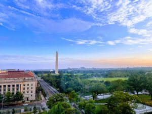 View of the Washington Monument during sunset from the rooftop patio at the Hotel Washington