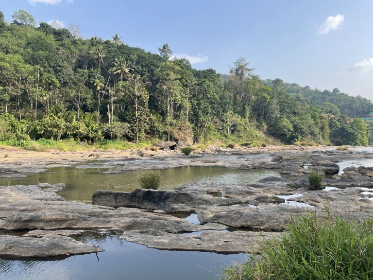 Amazing view from Kannan Devan Hills and a river, Kerala.