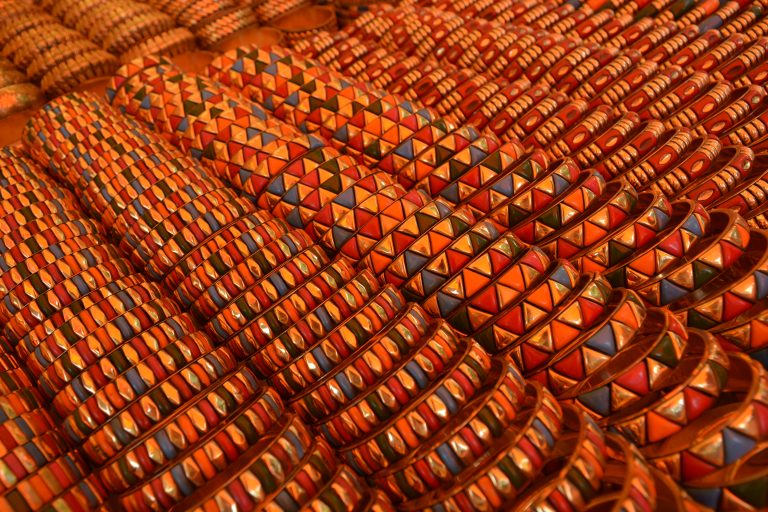 Bright colourful patterned bangles on display in a local shop Chooda, Rajasthan