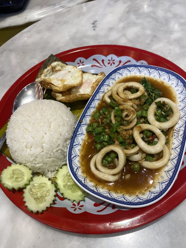 Stir-fried squid served with rice fried egg