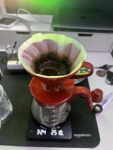 View larger photo: A coffee being brewed on a V60 brewer