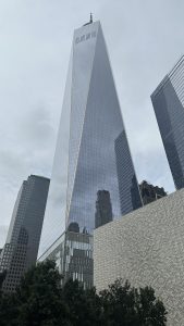 A perspective view of One World Trade Center from the bottom.
